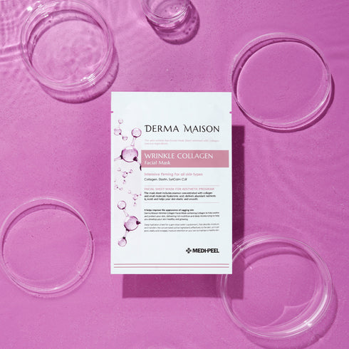 Bucurați-vă de beneficiile anti-îmbătrânire ale măștii faciale WRINKLE COLLAGEN FACIAL MASK de la DERMA MAISON. Acest produs esențial de frumusețe este realizat cu măiestrie cu o formulă puternică de colagen, prezentată pe un fundal violet vibrant, indicând proprietățile sale regenerative. Perfectă pentru diminuarea aspectului ridurilor, această mască hidratează și întărește, lăsând pielea revitalizată și netedă